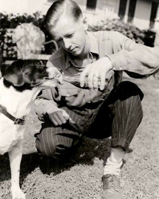 bsb1945's tweet photo. This post is incorrect. This photo looks to be taken in the 1960s, more than a decade after the appearance of Snoopy. The real inspiration for Snoopy was Schulz’s childhood dog, Spike, who liked to drink Coke from the bottle. https://t.co/ew9Mb1bPYx