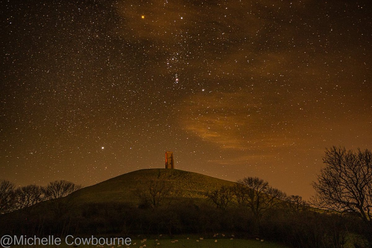 A clear night so I couldn't resist a wander amongst the stars. Taken in Glastonbury about 30 minutes ago. Sheep nestle below the wonder at the bottom of the scene.