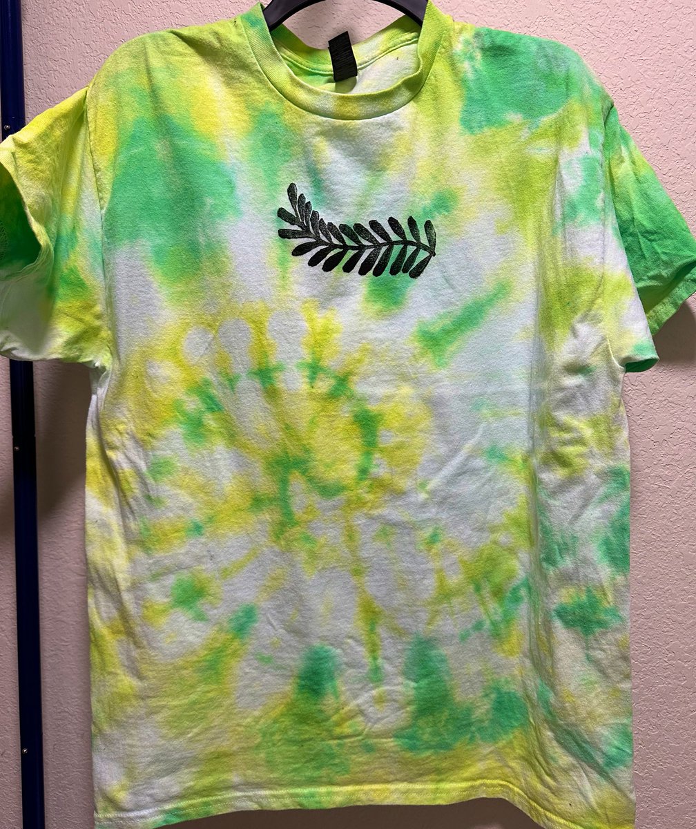 CicadaDazeCo's tweet photo. first two shirt attempts which are waiting for their final wash in a week! 
i obviously still have a lot to learn but im having fun :) i do not own the professional materials (like that huge canvas press thing) but i dont for my jewelry either so 🤷‍♀️ we make do! https://t.co/pa4D2mmM2q