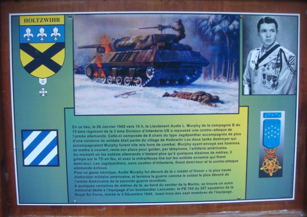 Vanguard_WW2's tweet photo. 🇺🇸 An American hero
26 January - Holtzwihr, Colmar Pocket, France.
A diminutive 19-year old recently battlefield commissioned 2nd Lt named Audie Murphy  clambers onto a burning tank destroyer, which can explode at any moment, and uses its .50 caliber machine gun against the enemy. Alone and exposed to German fire from 3 sides, he kills dozens of the enemy and halts their attack. He holds the position for almost an hour, fighting off constant attempts to eliminate him. Hit in the leg, he fights on until his ammunition runs out and then makes his way to his company. Refusing medical aid, he returns and leads a counter attack, forcing the enemy to withdraw. He will receive the Medal of Honor and will end the war as the most decorated American serviceman.
