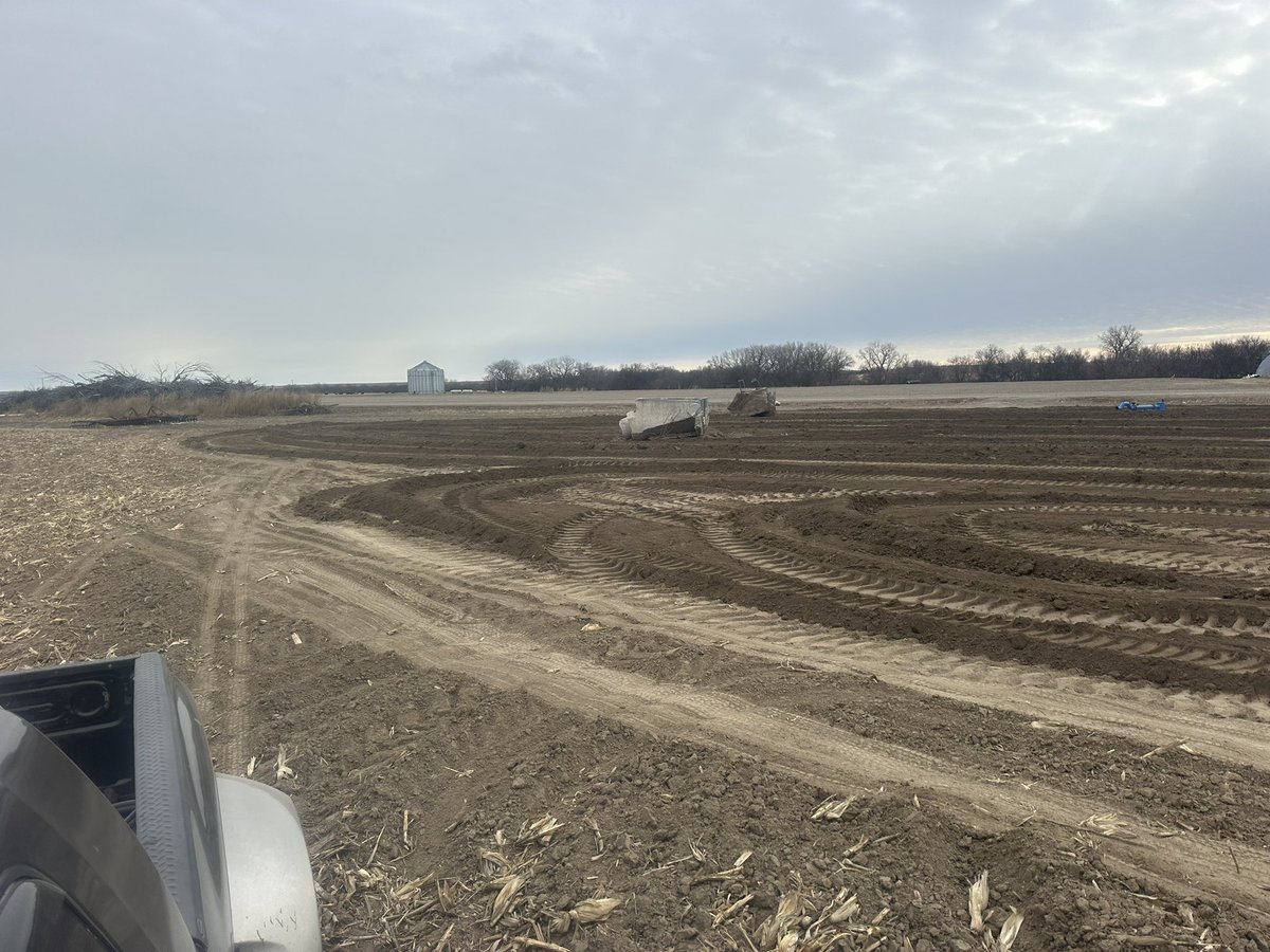tmonteIH's tweet photo. Bye, bye irrigation canal. Been a long time coming to put this whole deal together but we are so close to being able to swing a 1260’ pivot 180° instead of laying out 4000’ of 8” gated pipe. We cleaned out the old railroad right of way almost three years ago and now the old ditch is finally coming down. Won’t be long and there will be a Reinke pivot standing here. Of course it’s right along Highway 383 east of Long Island so I’m sure everyone is speculating about what we are up to.