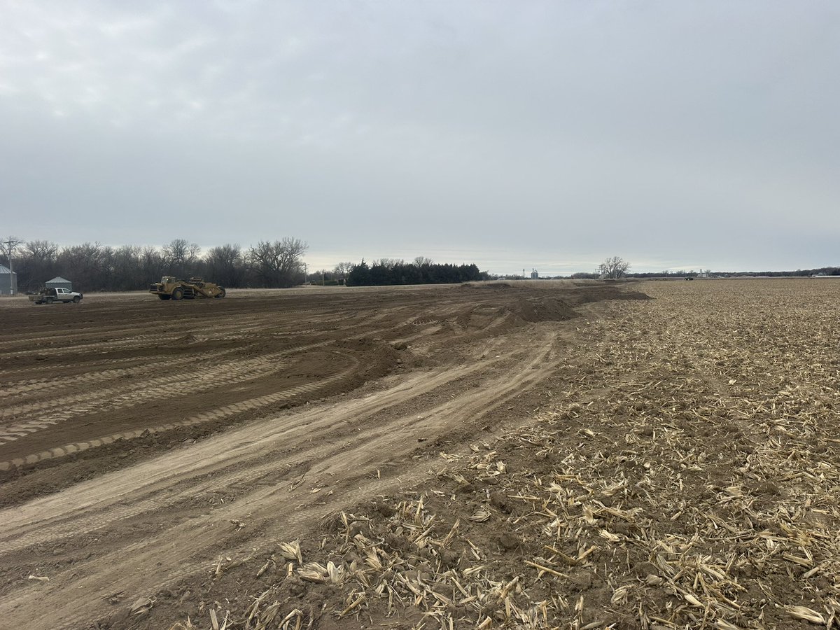 tmonteIH's tweet photo. Bye, bye irrigation canal. Been a long time coming to put this whole deal together but we are so close to being able to swing a 1260’ pivot 180° instead of laying out 4000’ of 8” gated pipe. We cleaned out the old railroad right of way almost three years ago and now the old ditch is finally coming down. Won’t be long and there will be a Reinke pivot standing here. Of course it’s right along Highway 383 east of Long Island so I’m sure everyone is speculating about what we are up to.