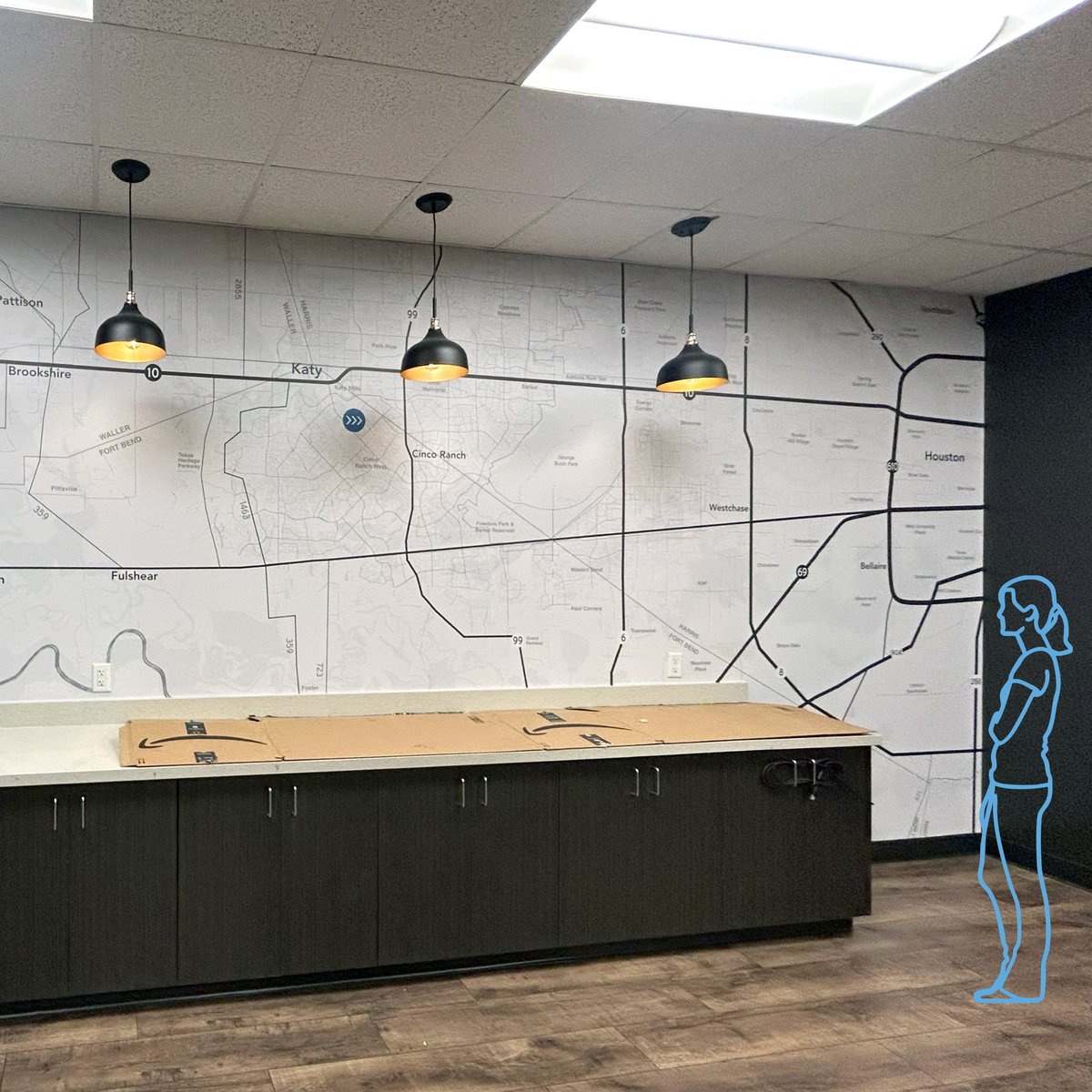 madebyamus's tweet photo. Always a good idea to keep human scales nearby for reference (and any other elements that may interact with a design). Here’s a custom wall graphic being installed at the moment, swipe right to see it. Dimensional sign in the middle of the wall still in fabrication. 
#madebyamus https://t.co/KVFwEmCbUk