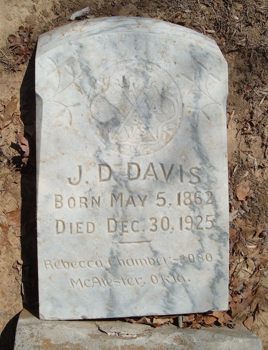 Can anyone tell me what the top emblem means? J. D. Davis was an African American barber in SE Oklahoma.