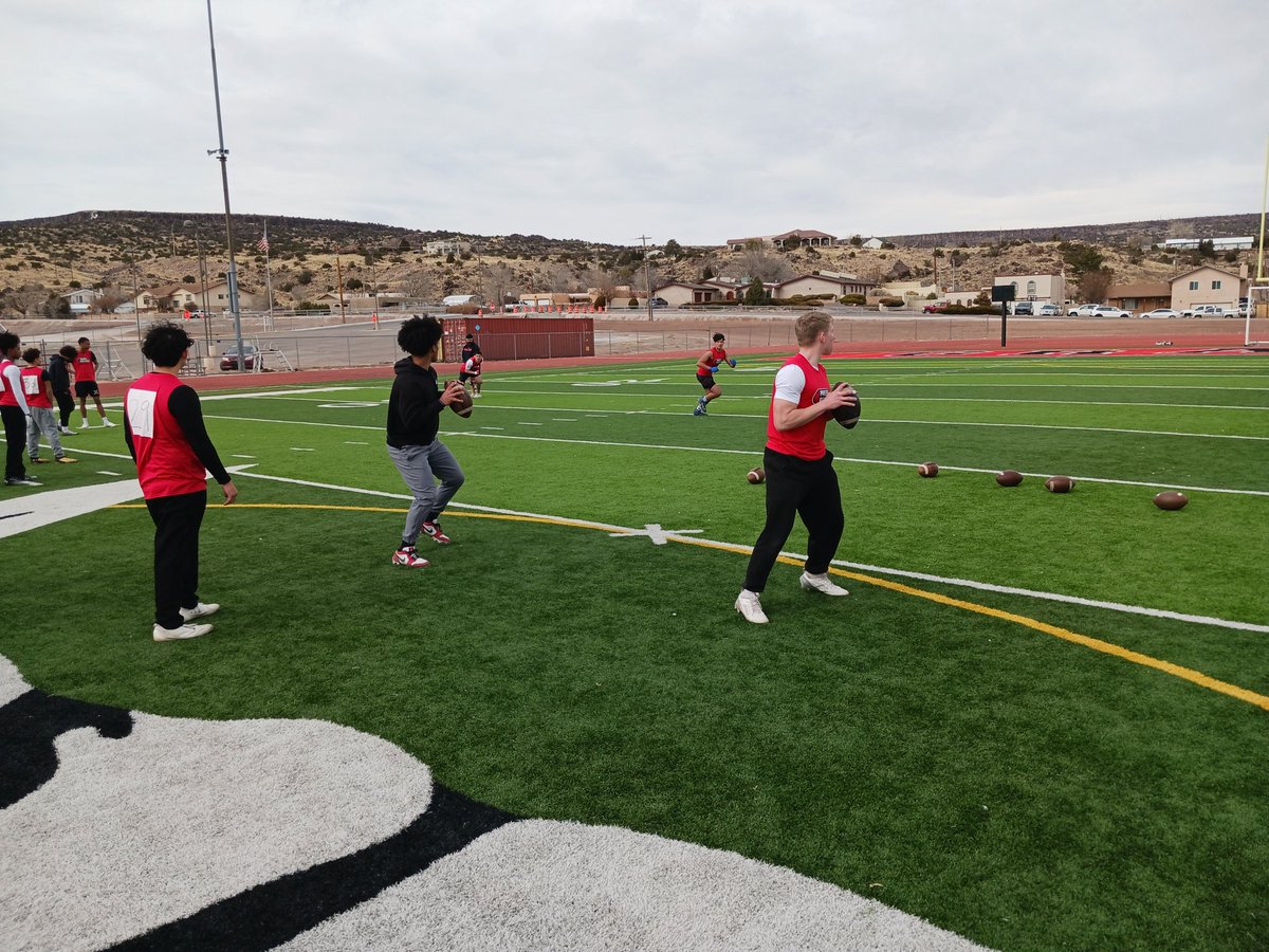 QBs throwing to receivers. Impressed with the throwing arms and accuracy of the QBs here.