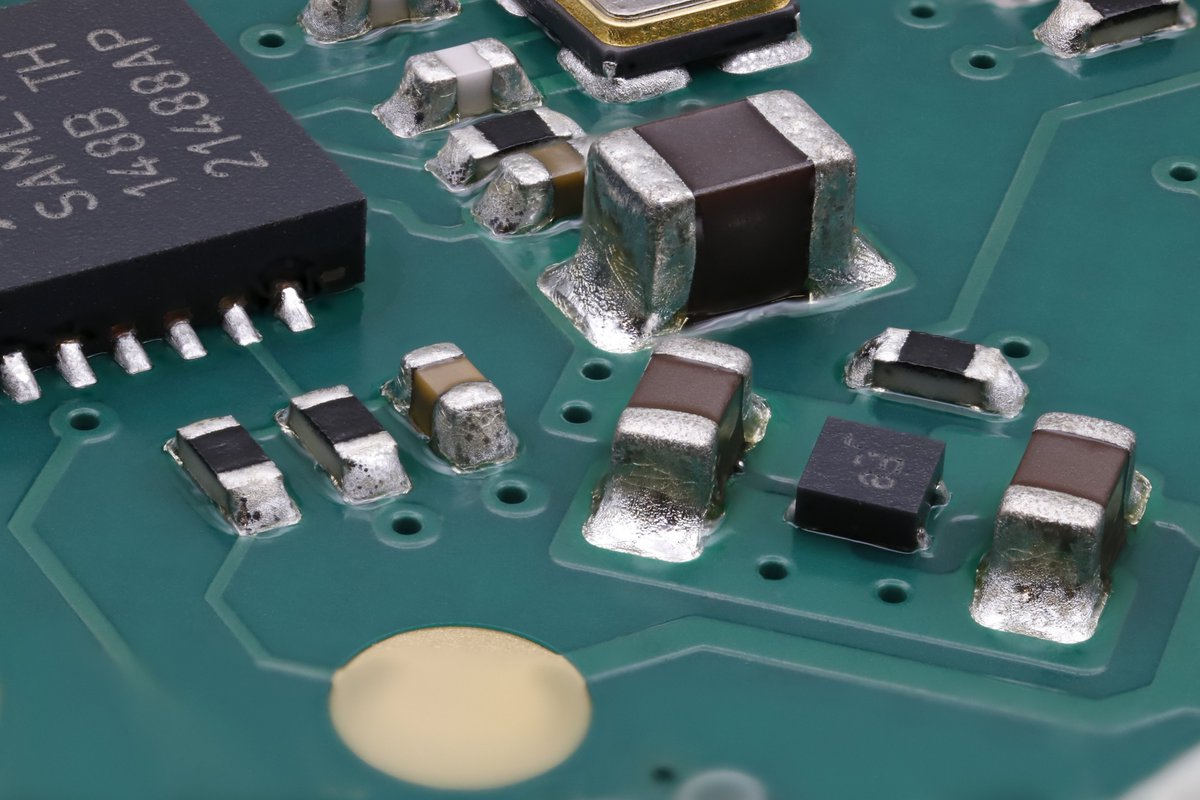 This cute little voltage regulator makes 0603 capacitors look huge by comparison. 😅