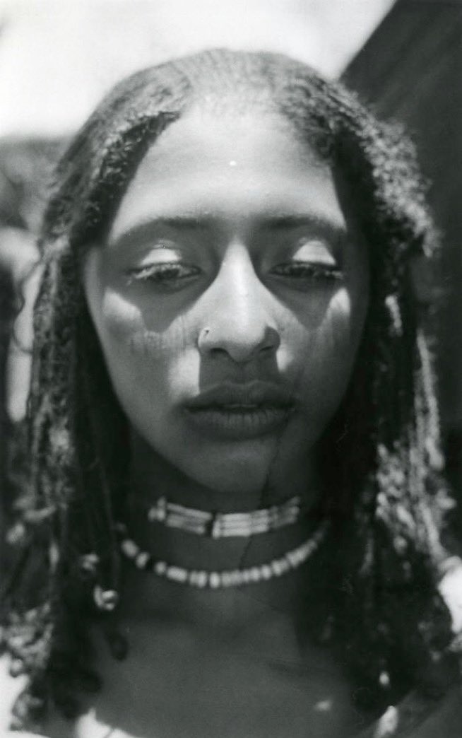 A woman from Umm Korara, South Darfur, 1981—captured in timeless grace through the lens of Paul Wilson.