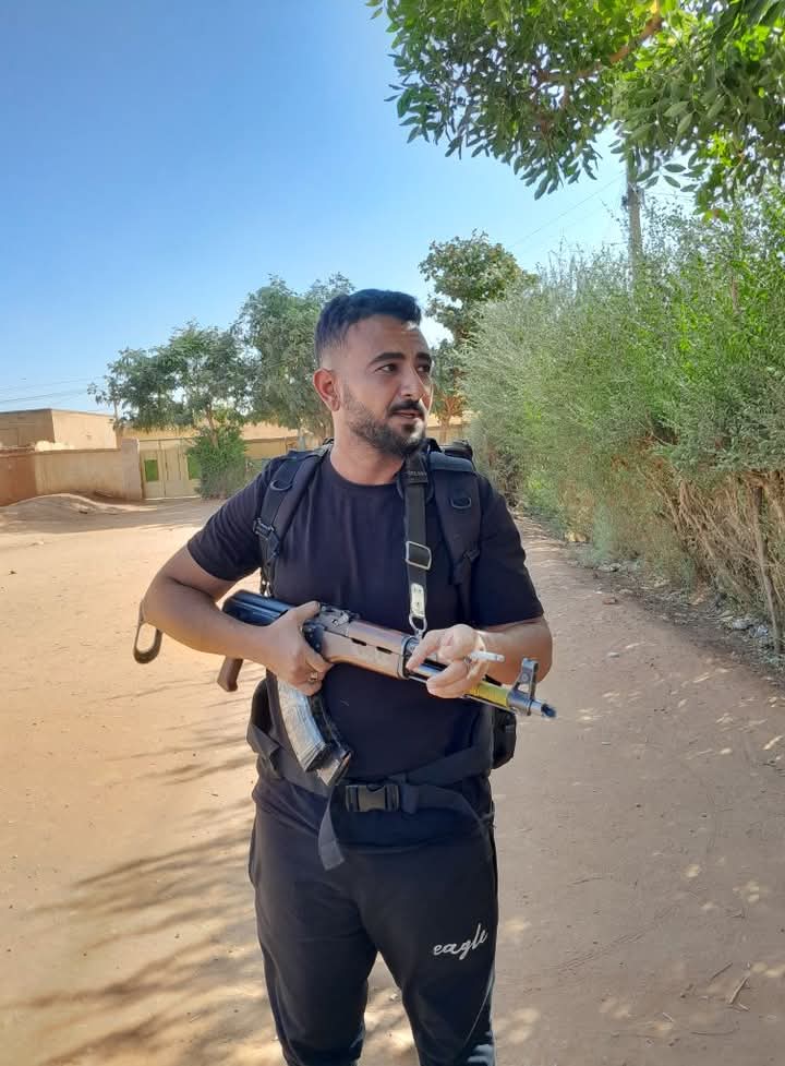 جرجس روحي 
نفسي اعرف القحاطة بقولوا عليه شنو ؟ 
مصطلح كوز هنا ما بمشي عليه او جهادي جندي مليشيا حركة إسلامية.