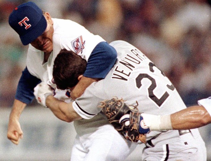 Nolan Ryan puts Robin Ventura in his place after he charges the mound, August 4, 1993.  Ryan was 46 years old and Robin Ventura 26. Ryan grabbed Ventura in a headlock and proceeded to deliver multiple punches to Ventura's head, landing four quick right-hand blows to the top of