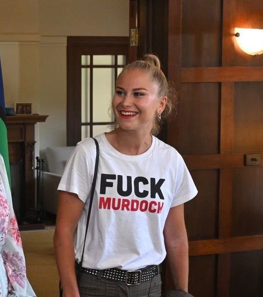 Sahar_A_Writes's tweet photo. "The T-shirt is clearly not just about Murdoch—it's the obscene greed, inhumanity &amp; disconnection that he symbolises, which are destroying our planet."

Grace Tame: fearlessly unapologetic; fiercely real. Proving, again, why she's indispensable for Australia's conscience #auspol https://t.co/YbRh7GCeqm