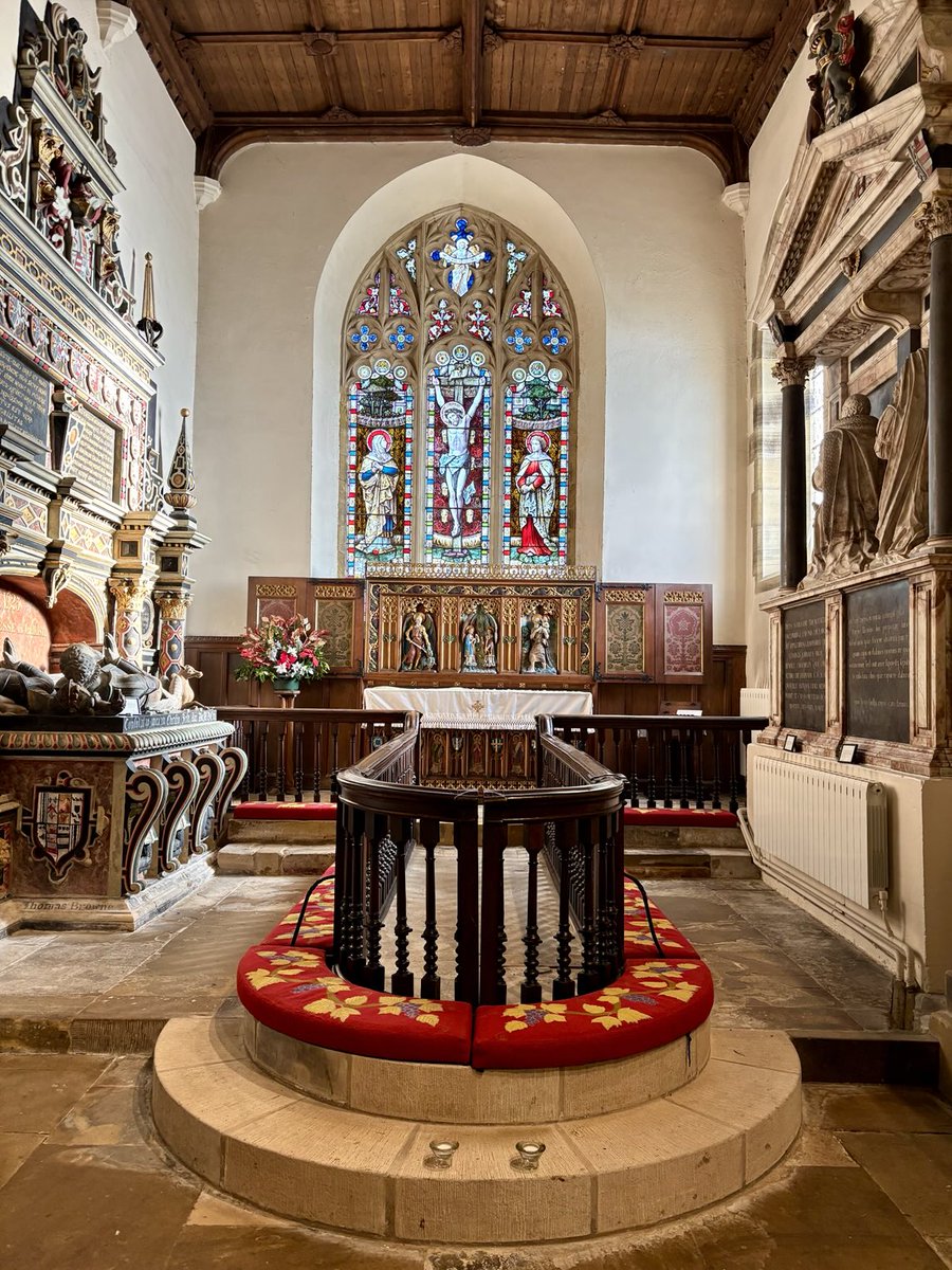 The chancel of St. Michael’s Church, Coxwold, North Yorkshire…with its fantastically shaped communion rail, colourful reredos and stunning monuments - see below for photos of the monument visible here on the left, which is particularly impressive…