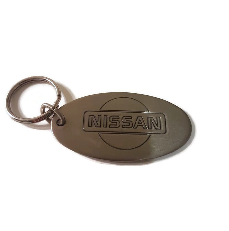 arlissbryant's tweet photo. Nissan Keychain Vintage Automotive Gift Collectible https://t.co/568DeZNUpJ #WainfleetTradingPost #Shopify #KeyChainForWomen https://t.co/JaM2DzrfLp