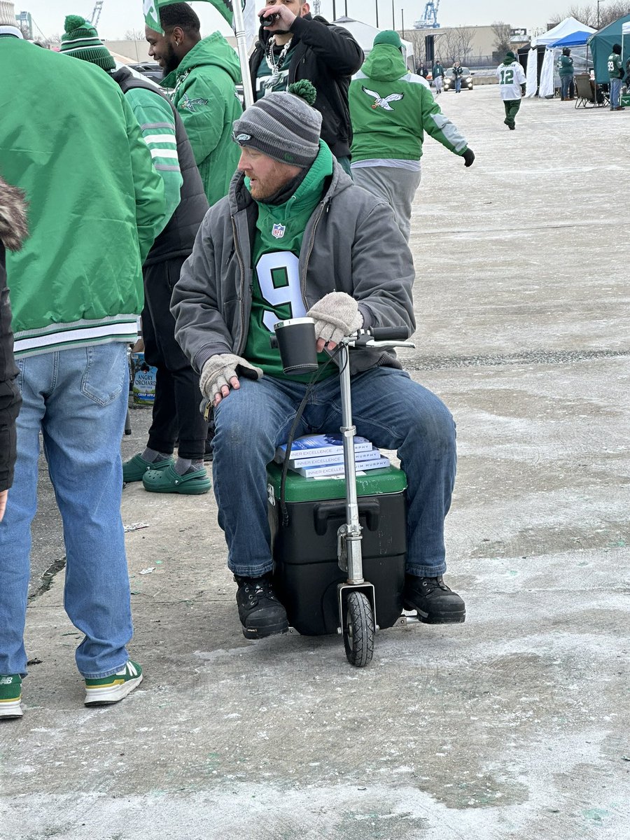 We have a guy in a boozer scooter handing out Inner Excellence copies. Go Birds 🦅