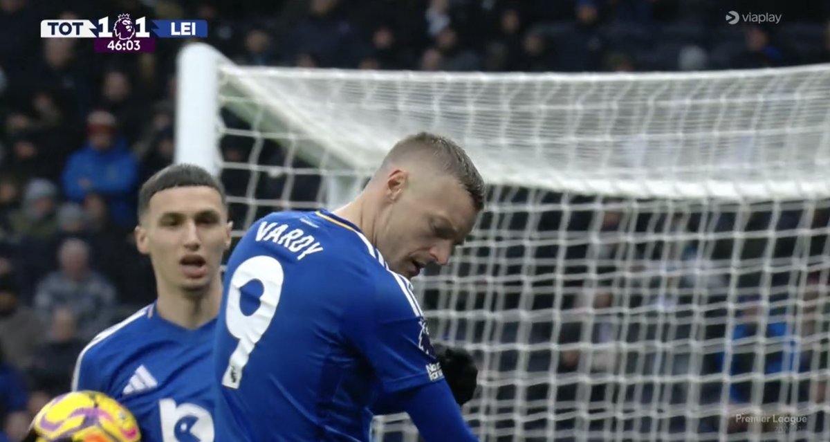 paddypower's tweet photo. Jamie Vardy showing off the Premier League badge to Spurs fans again. King of the sh*thouses. https://t.co/LSBJvmpUhy