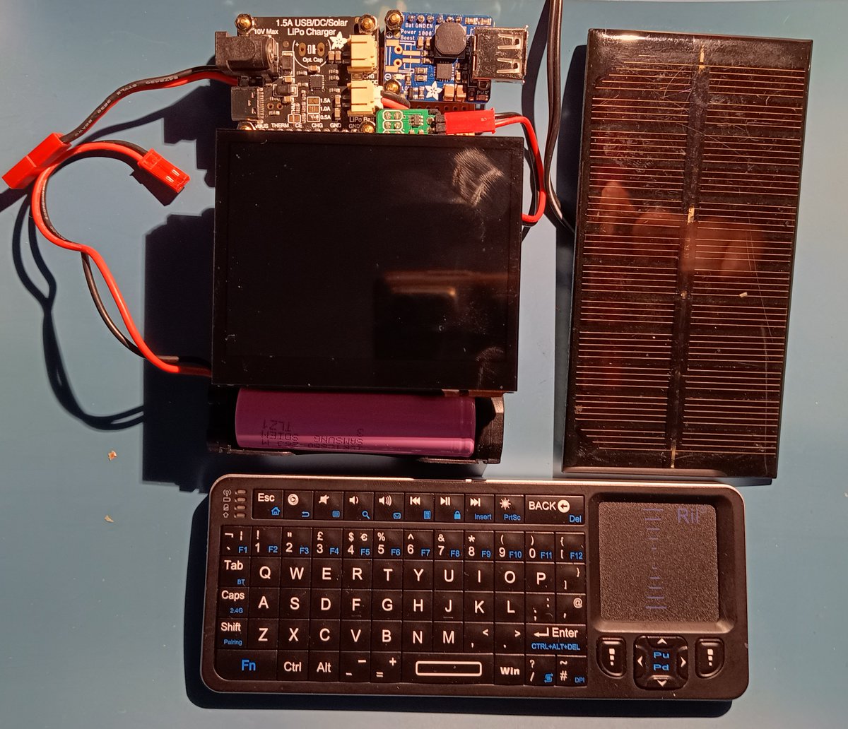 Latest mock up of the #Solar #Computer. The fan was the latest stumbling block but was eventually overcome &amp; hangs under the PCB above the CPU. It sits in one one hand ok so the touch screen can be used. Custom PCB to come ASAP thanks to <a href="/AislerHQ/">AISLER</a> hopefully bringing improvements.