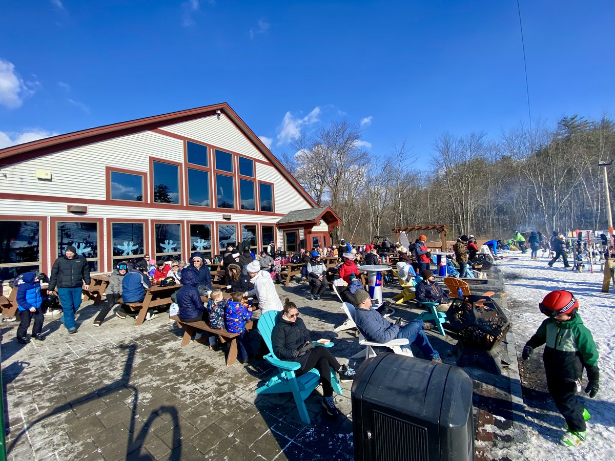A picture perfect Sunday on the slopes! We're all smiles in snowsports, racers are skiing and riding fast with the Gilman Fun Run, and a great day to be out on the patio enjoying the sunshine and warmth from the fires and good vibes all around.