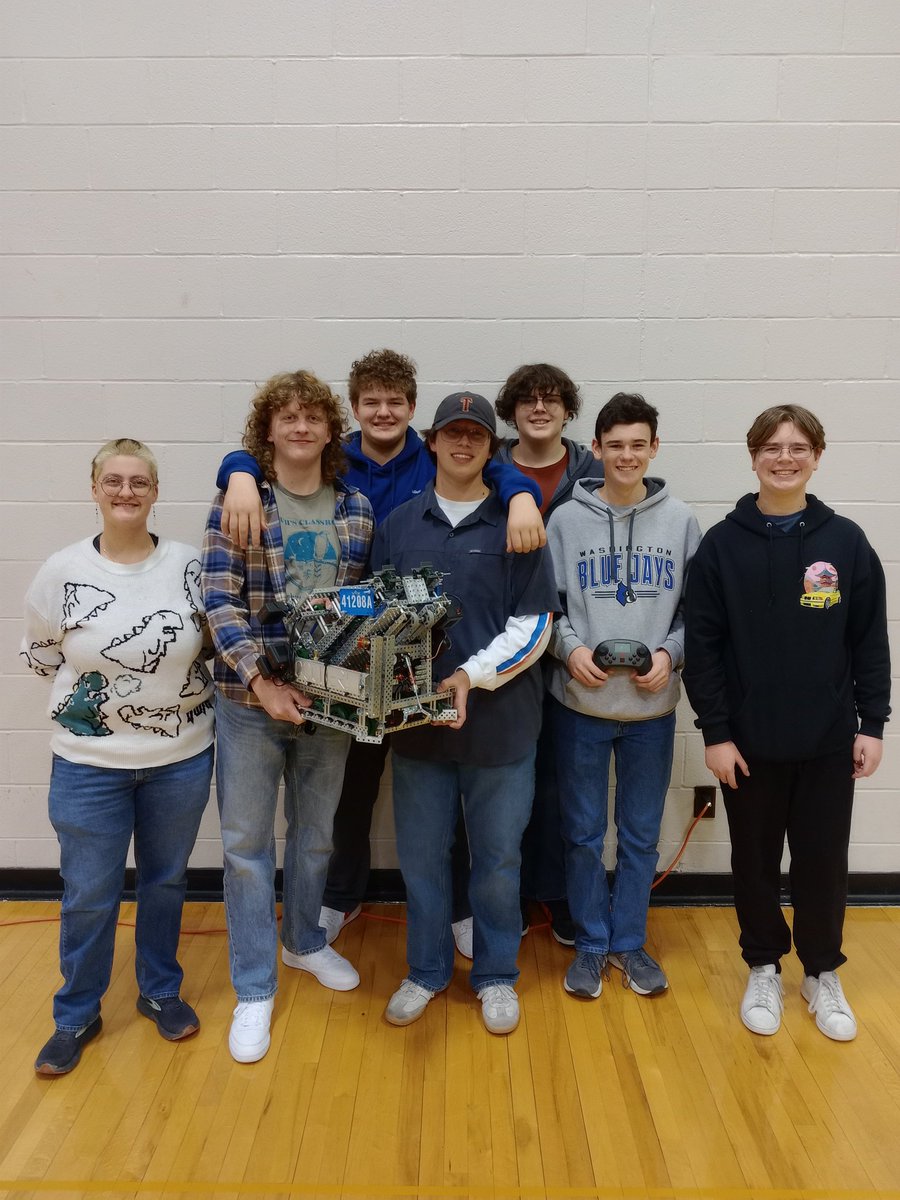 WHSRobotics2's tweet photo. WHS Robotics is in action today in Troy at the VEX Robotics Troy Winter Classic.

4-1 so far on the day. 

Team Members Left to Right 
Noa Nappier
Simon Figas
Miles Cochran
Gavin White
Brayden Miller
Isaac Brune
Anderson Collins

@SDofWashington 
@gowhsbluejays 
@WHSBlueJays https://t.co/kF3iyYMesX