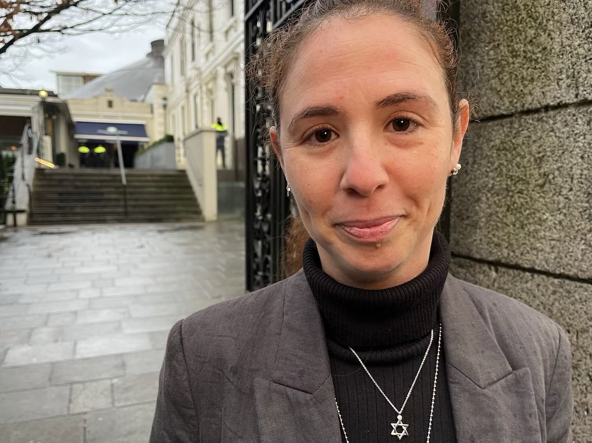 This is Lior Tibet, a pregnant Israeli teacher living in Ireland.  She is the Jewish woman who was forcibly dragged from a Holocaust event today.  The circulating video shows her being dragged by her arms across the floor as not one person attempted to stop the attack. 

The