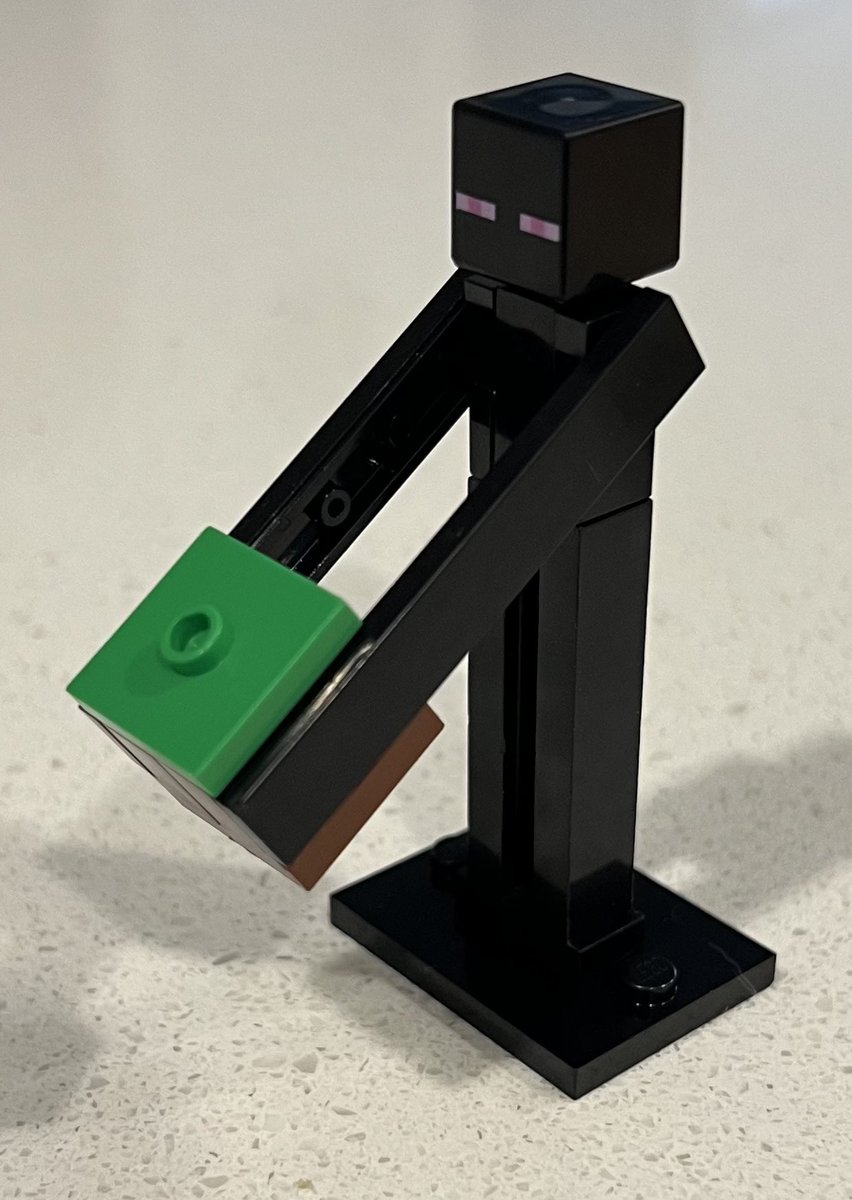 Enderman Reddish Brown Block with Bright Green Top (used) added to the store.