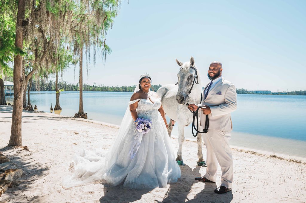 DisneyWedCast's tweet photo. Antonio and Jasmine took portraits around Paradise Cove between the ceremony and the reception—including some with the horse that pulled Cinderella's carriage! Learn about Paradise Cove wedding add-ons on page 175 of the Fairytale Weddings Guide! https://t.co/PWnJ7z77dq https://t.co/oss4VnuKHJ