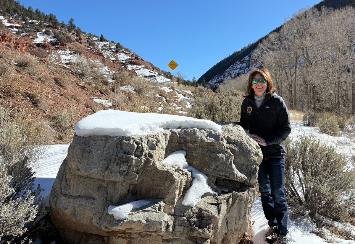 The “Large boulder the size of a Small boulder" is celebrating its 5-year anniversary today with our Sheriff’s Office. We thank the boulder for its service entertaining 77 million who've viewed our post in the Twitterverse. Pictured: Tweet author PIO Susan Lilly with The Boulder.