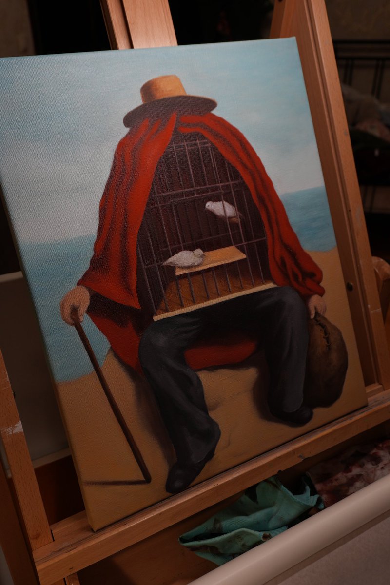 reproduction of a Magritte painting in the progress…