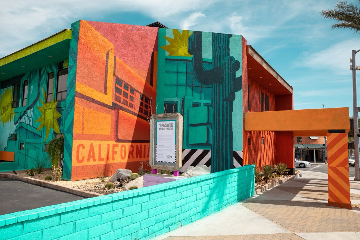 Mural.Palm Springs  360 degree mural wrapped around this odd shaped building in the Desert.   -lots of coffee.