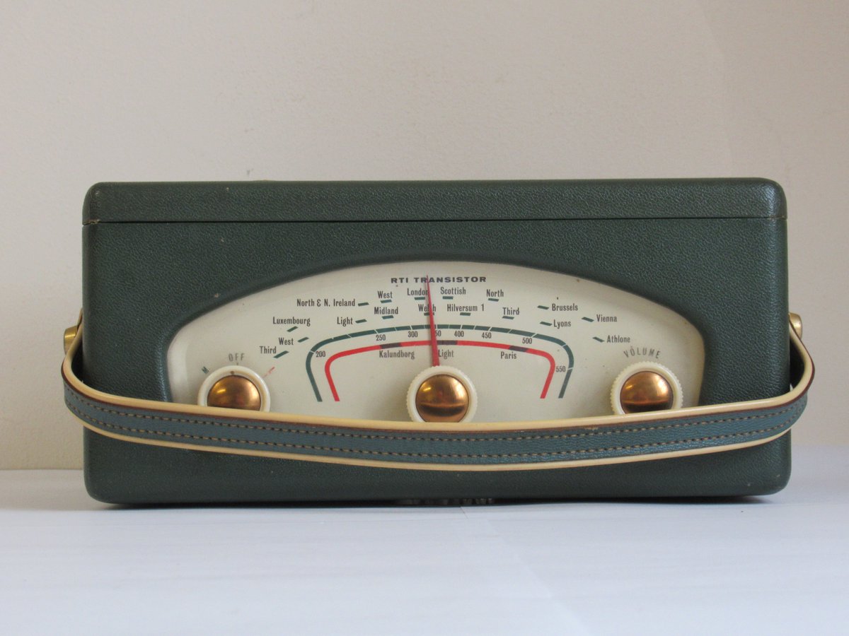 Wireless in Wales: The Roberts RT1 transistor portable was made between 1958 and 1960. This is the first Roberts transistor radio; all components were made in the UK! Why is it this shape? The designer got the idea from his wife's handbag......