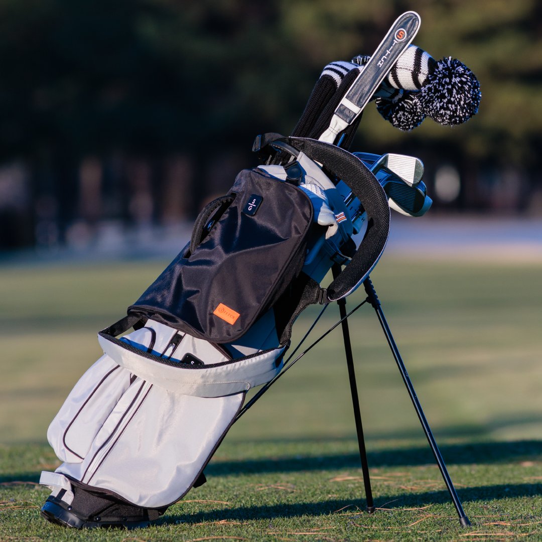 Introducing the Shoe Saddle: Easily transport your golf shoes to and from the clubhouse with our Shoe Saddle. Perfectly attaches to the SL2 Family of golf bags through the handle.