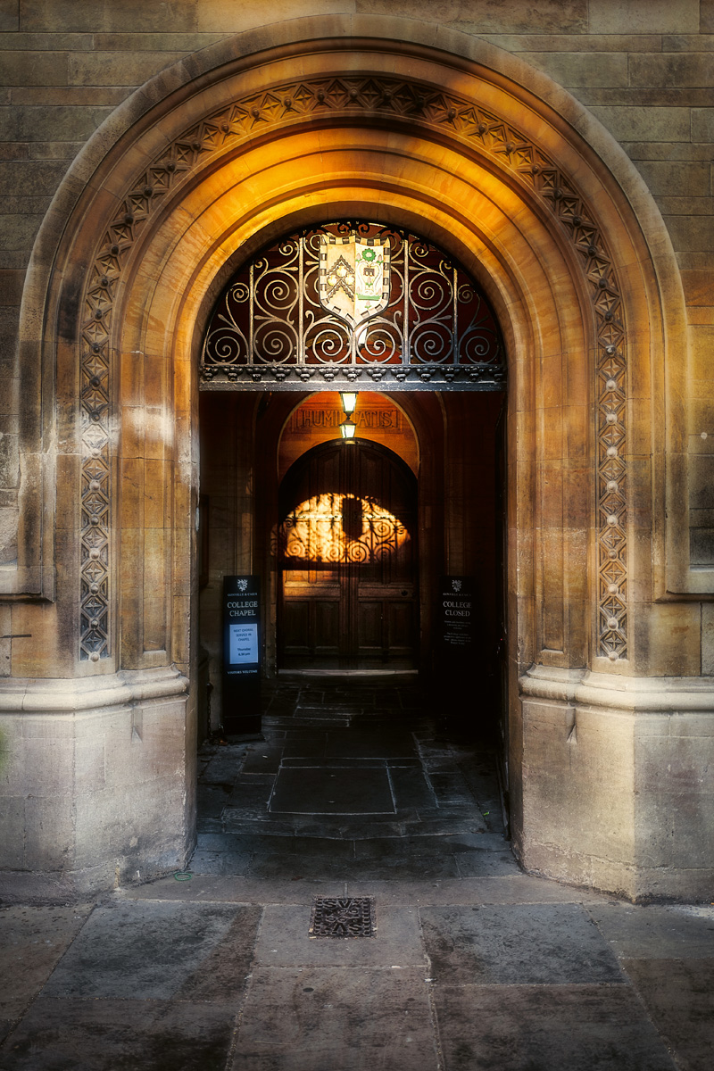 28th January 2020
Reflected glare from an opposite window strikes the Gate of Humility at Gonville &amp; Caius College, creating a watchful silhouette.
From my book 'Cambridge - Time &amp; Space' available at cambridgebooks.co.uk/cambridge-time… and all bookshops.