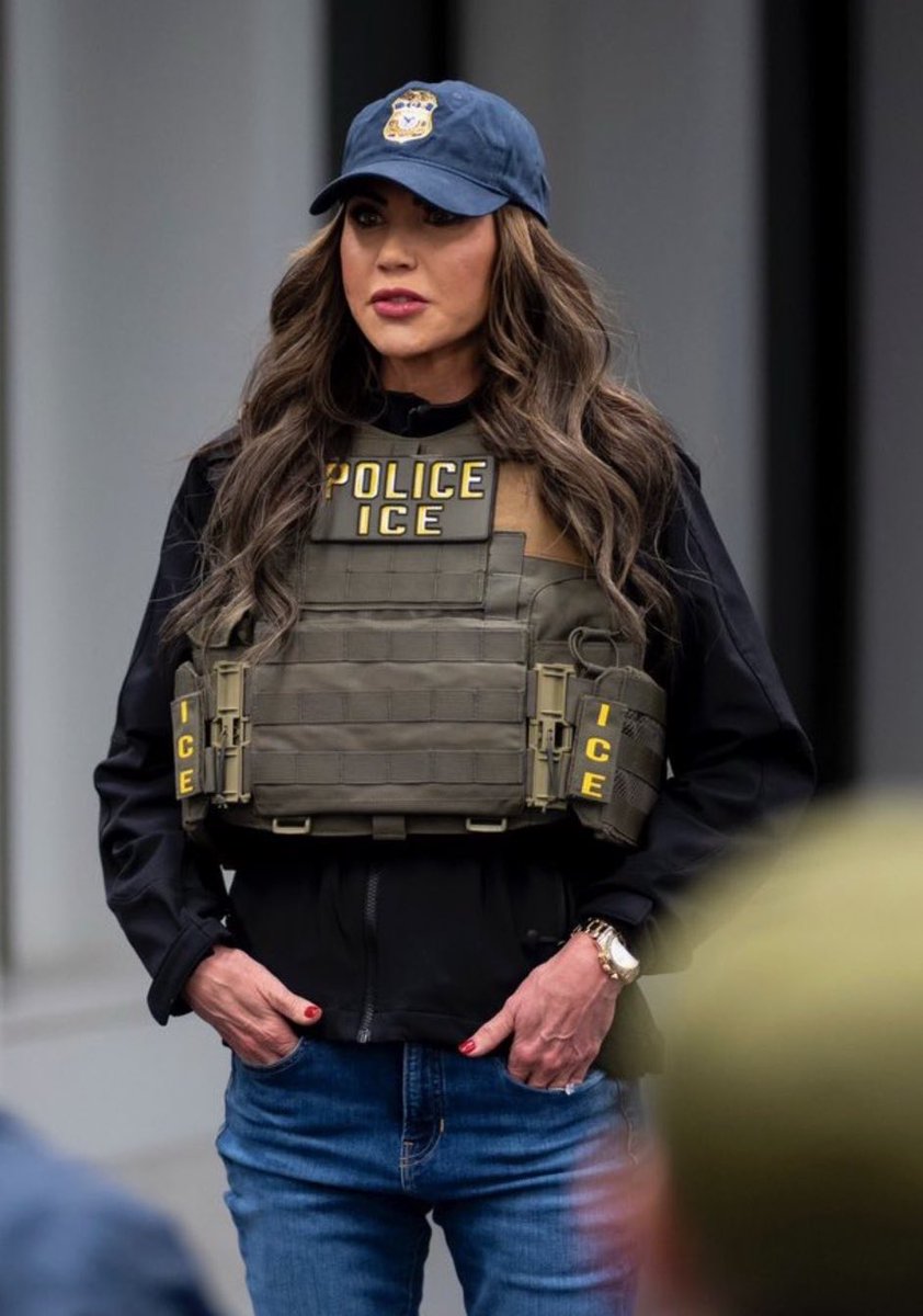 johnnymaga's tweet photo. Kristi Noem wearing a gold watch with her ICE tactical vest https://t.co/LF03SAXZ00