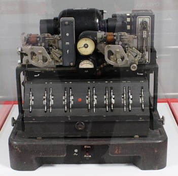 NCSCStreet's tweet photo. #TechTuesday: NCSC’s Wall of Spies Artifact, the Lorenz SZ 40/42, known as TUNNY. This encryption machine was used by the German High Command during WWII, but its code was broken by the British, yielding insights into German strategy and helping the Allies in the D-Day invasion. https://t.co/qIfGRJfoat