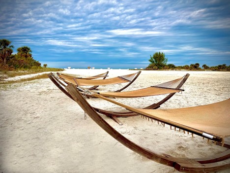 Unwind in a hammock on our private 13-acre beach at Sheraton Sand Key Resort. Whether you're reading, napping, or simply soaking up the Gulf Coast breeze, this peaceful spot is your perfect escape.

Come discover ultimate relaxation, just steps from the shoreline!