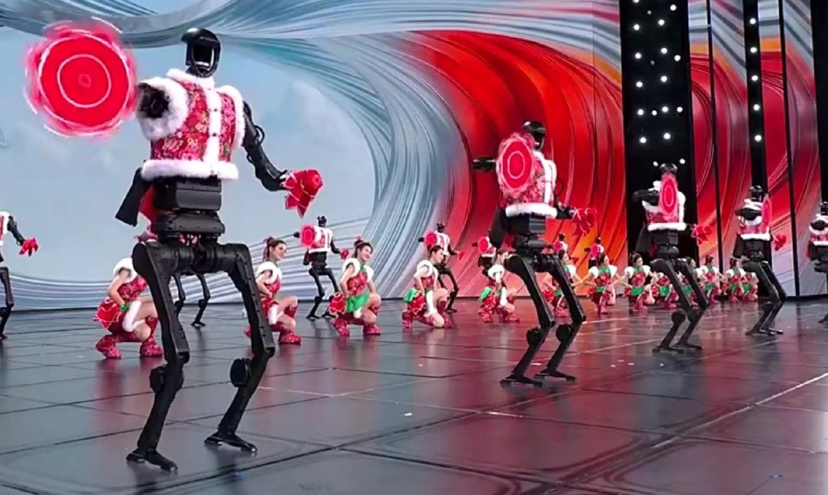 frabruce's tweet photo. A day after plunging US stock markets into complete chaos and shocking the world with its advanced technological innovations, China unveils its latest secret weapon:  a troupe of handkerchief-spinning dancing driods... https://t.co/e2PZqjLz2k