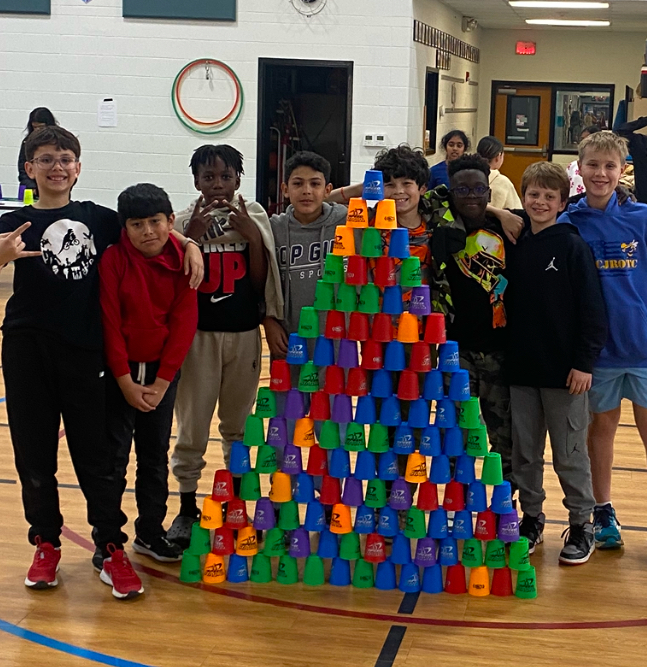 5th Graders cup stacking in PE with Coach Hunt &amp; Coach Gover!