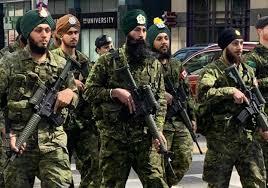 ImJulianAssange's tweet photo. Why were these Sikhs never charged with firearms offences and brandishing firearms in public? In Canada, brandishing a firearm without a lawful excuse is an indictable offense that can result in up to five years in prison. If they were white men they would still be in prison. https://t.co/UapUXTndFS