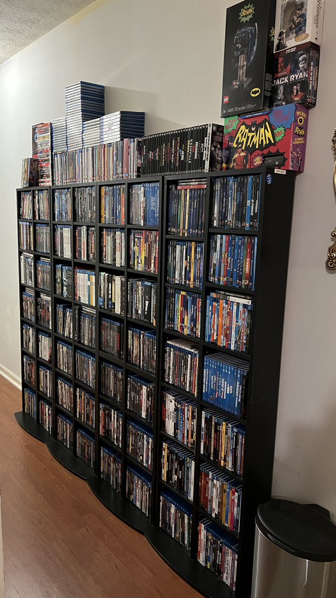HighDefDiscNews's tweet image. So, I moved 4 sets of my shelves and a whole lot of my #PhysicalMedia collection to my hallway. I’ve officially ran out of room. I’m forced to put movies in plastic storage bins until I get more shelves. The struggle is real. I like moves. Can you tell?