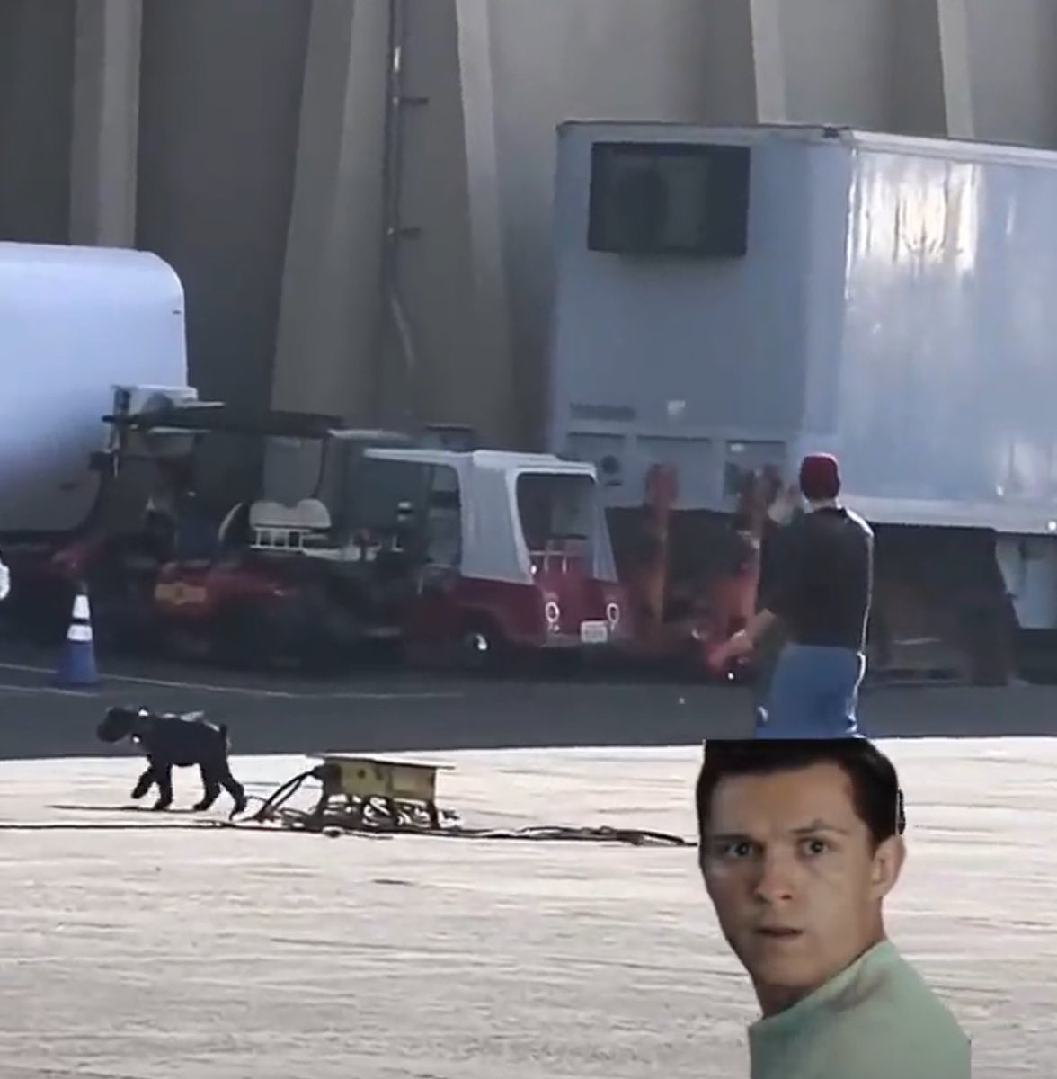 coykoii's tweet photo. tom walking noon near the euphoria set 🤭 https://t.co/oGYdVBo6kr