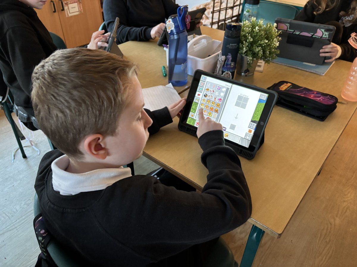 This afternoon for Digital Learning, we worked as a team to recreate parts of Bonnybridge using the Minecraft app.