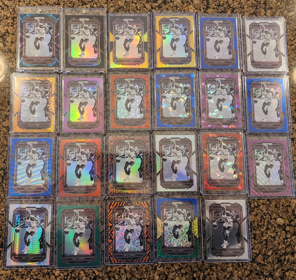 rhockett1's tweet photo. @CardPurchaser Dell Curry from 23/24 Prizm Draft Picks. Still just need the 1 of 1's on the auto. For the non autos I added the Red Shimmer and Green Pulsar after I took this picture, need the Green Shimmer /3, Choice Green /8,
 and the White Sparkle. https://t.co/GGr3PQEg5c
