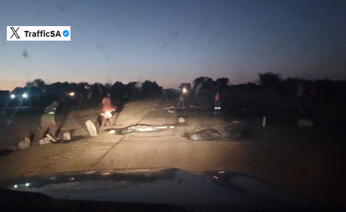 TrafficSA's tweet image. North West - R566 Route: #CommunityUnrest just east of Brits