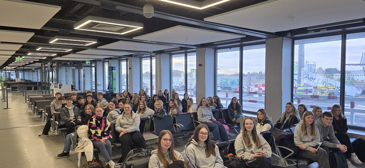 Group photo! Ready to get on the plane. Next stop Paris.