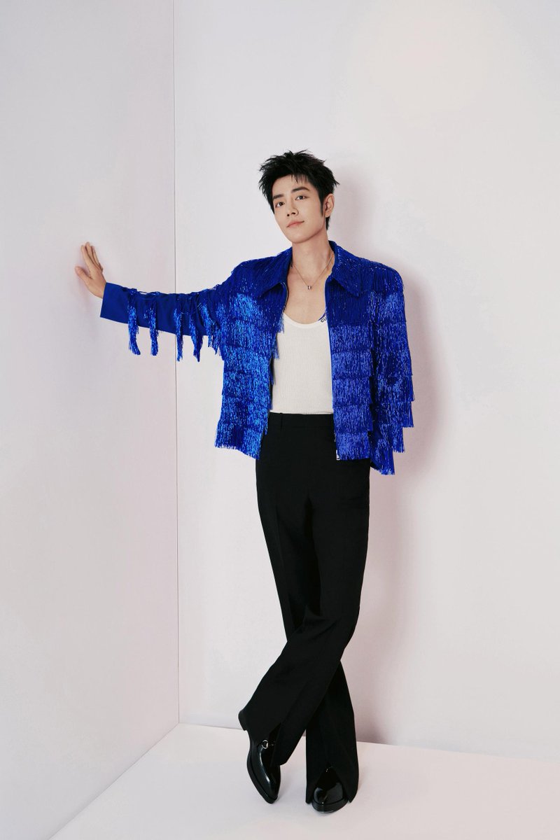 For BRTV’s Spring Festival Gala, Global Brand Ambassador #XiaoZhan wore a custom Gucci look featuring a jacket with all-over fringe, wide leg trousers, and Horsebit boots by Creative Director Sabato De Sarno.