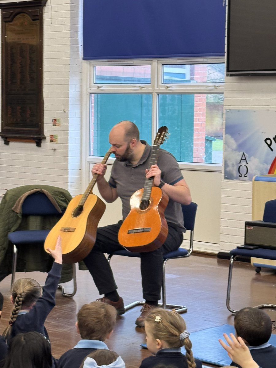 sss_year2's tweet photo. The children had a lovely time learning about different guitars from our very own Mr S! #sssmusic https://t.co/N0z3aGCxAn