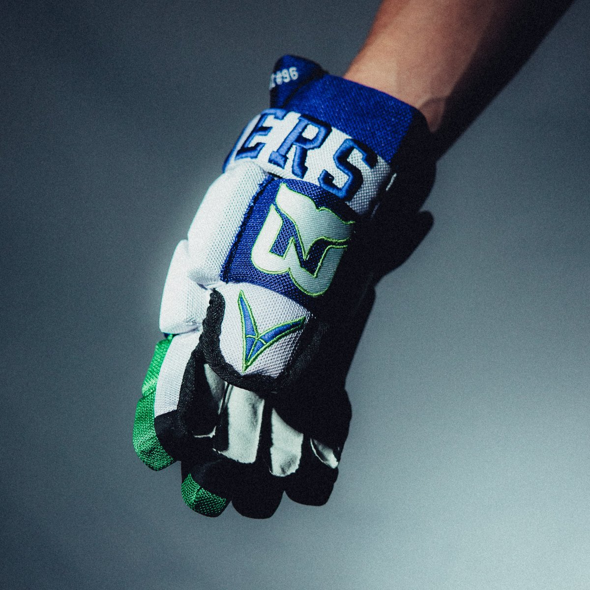 Trying out some single spot lighting with some hockey gloves.

I think I'm a fan but also thinking maybe a pop of color could help.