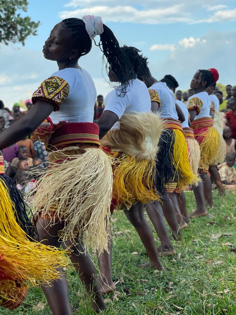GoCorps's tweet image. "Community dance and drama performance under the local mango tree. Girls are preforming a tradition Busoga dance from eastern Uganda. Girls use the dancing and traditional wear to attract a crowd and then they preform a gospel related drama." -Neika, Youth Development Track