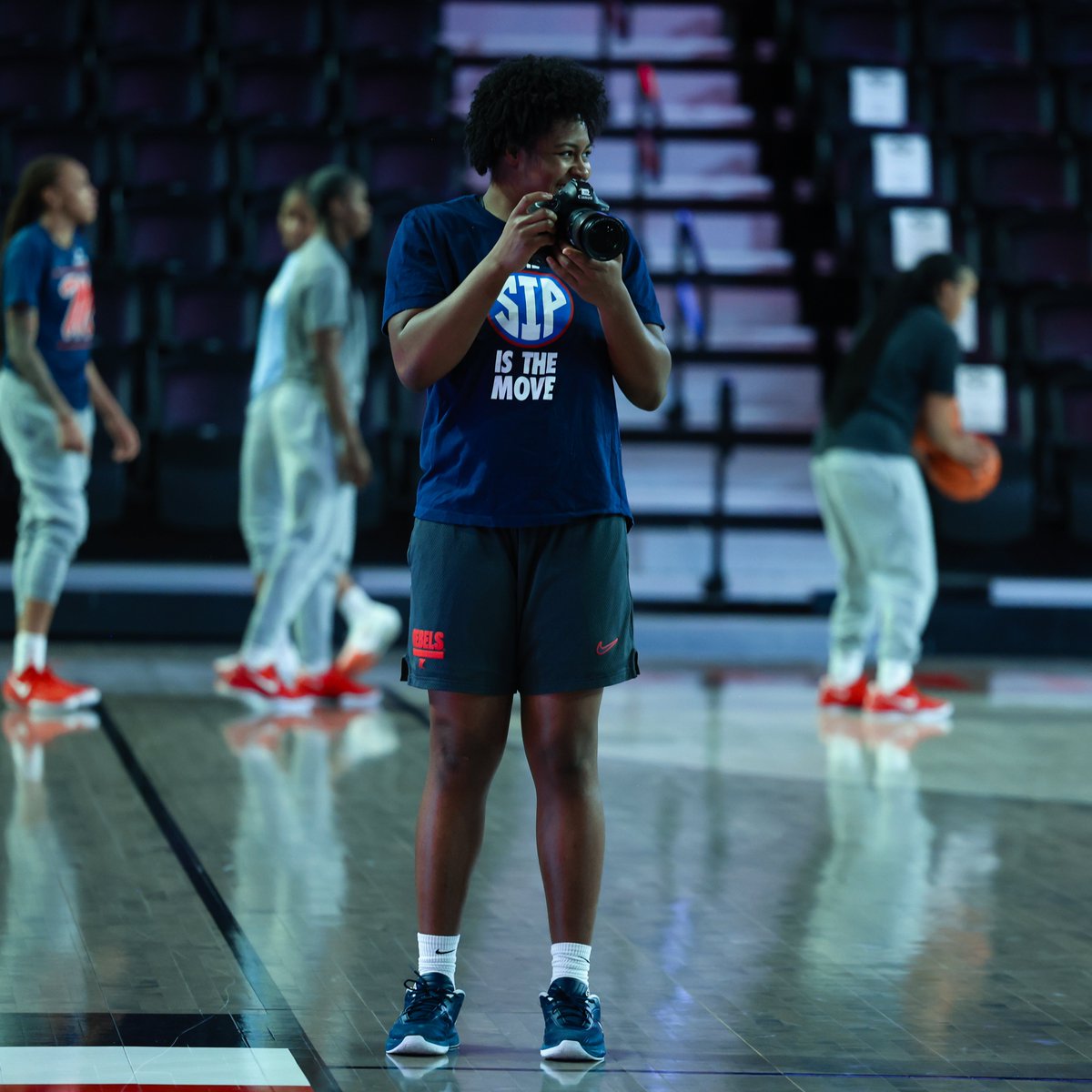 OleMissWBB's tweet photo. They can do it both 🏀📸

@OleMissCreative y'all need some extra photographers? 

#HottyToddy https://t.co/2lgUInRI5J