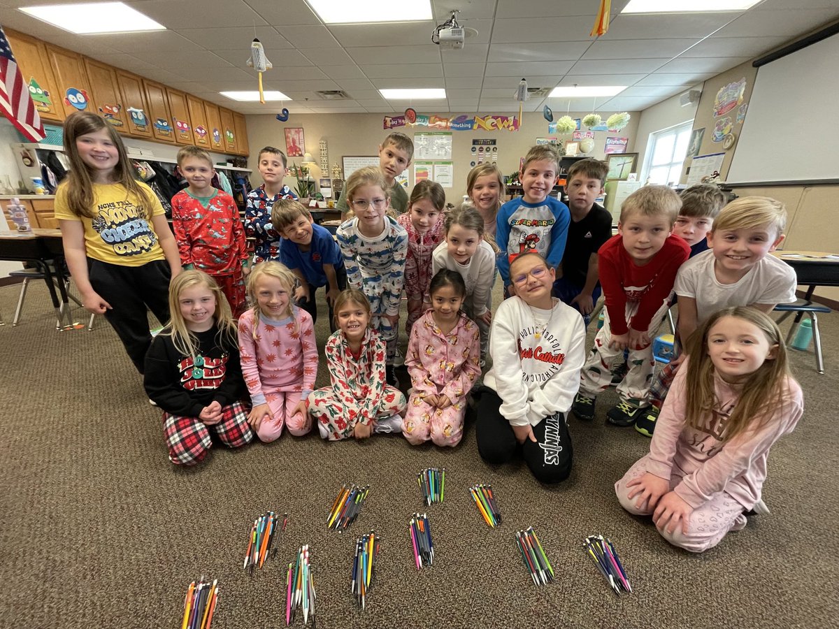 Happy 100th day of school from these NC 2nd graders! They found all 100 pencils hidden around the classroom! We also celebrated CSW in pjs today. #norfolkcatholic
