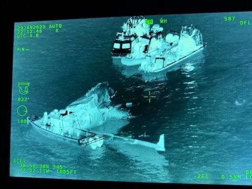 🚨#BREAKING: New images are being released showing helicopter shots of rescue boats surrounding a crumpled fuselage section from AA Flight 5342 floating in the Potomac