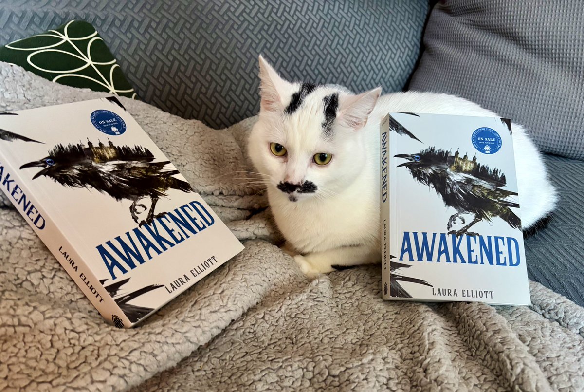 THE PROOFS OF AWAKENED ARE HERE &amp; so there was only one thing to do: a photoshoot with hercule purrot!

he’s not sure why they’re important but if you’d like to contribute to his dreamies fund Awakened is available to pre-order 🐦‍⬛😇

(am i doing this marketing thing right?)